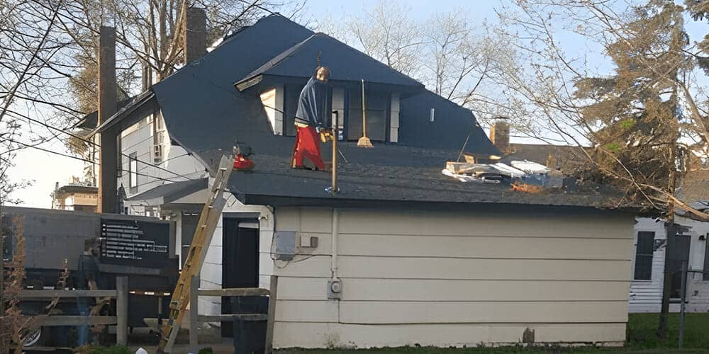 Roof Tear-Offs and Rain: How Professional Roofers Protect Your Home